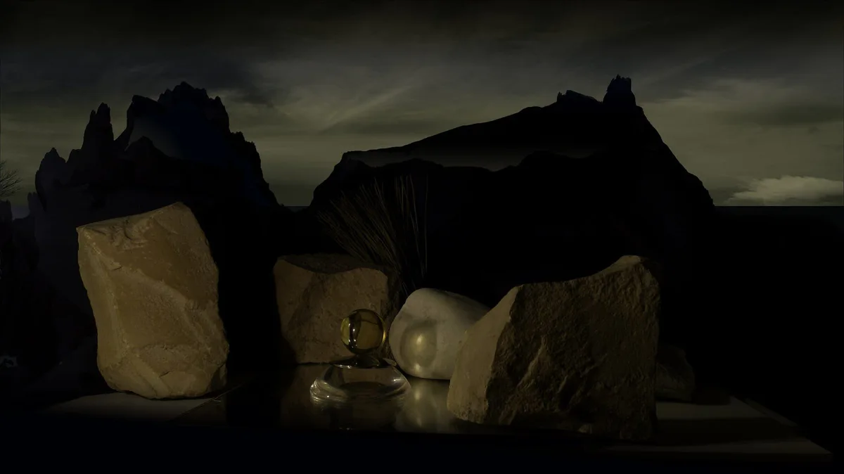 Hilarion Manero, The Book of Death (Nyx und Andromache), 2014: dunkle Felsformationen und ein weißes Tuch unter einem Wolkenhimmel
